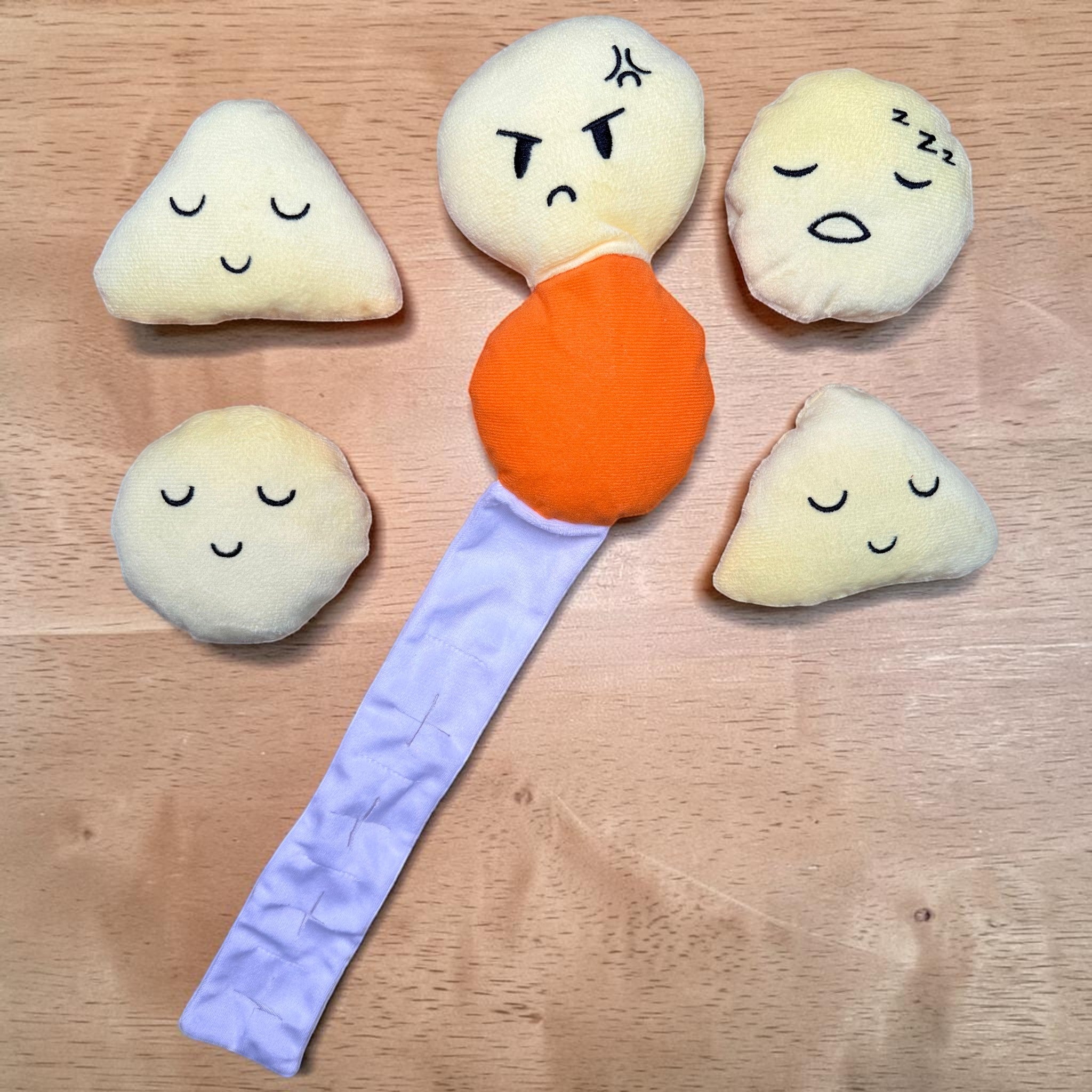 FurSniff Chips Bag Snuffle Toy Set with five plush potato toys, each with a unique embroidered face, and a purple fabric strip.